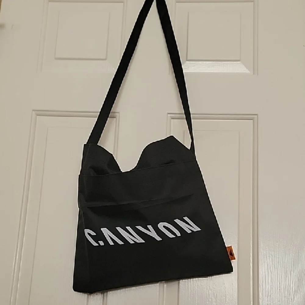 NEW CANYON BICYCLES Messenger Bag with Nylon Fabric Front Pocket Snap Closure